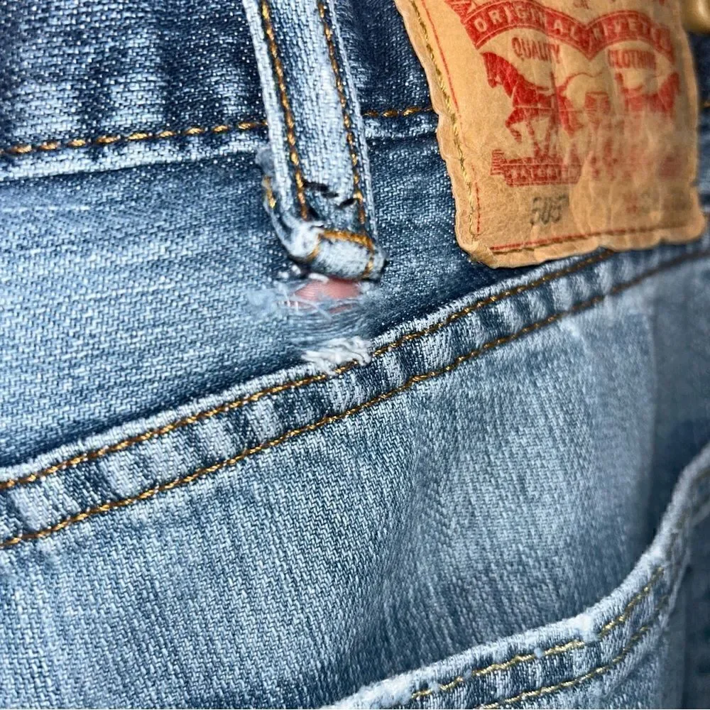 Levi’s 505 Distressed Denim Jeans